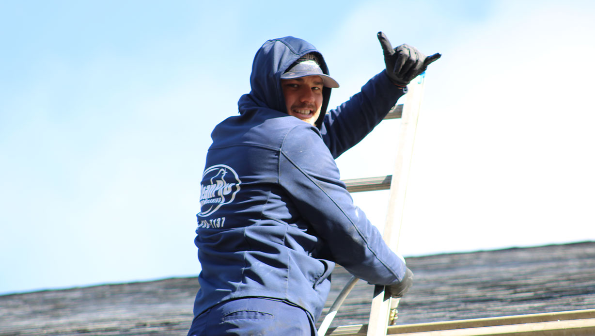 Roof cleaning for commercial buildings in St. Louis, MO, using professional power washing methods